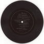 Various – A Joint Effort Between / Uno Sforzo Comune Fra Dynamo Magazine Helter Skelter & Revelation Records - (7")