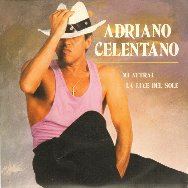 Adriano Celentano ‎– Mi Attrai / La Luce Del Sole - (7")
